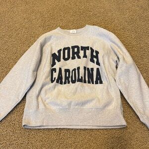 Grey North Carolina Champion Reverse Weave Crewneck.
